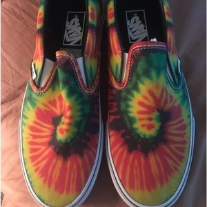 Vans unisex slip on sneaker, never worn.men size 9 women size 10.5